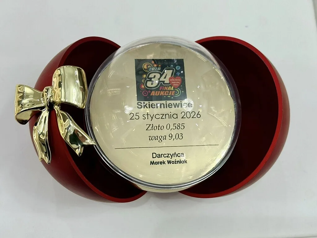 Złote Jabłuszko WOŚP 2026 wykonane przez MW Jubiler z 14-karatowego złota i bursztynu